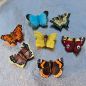 Preview: SPARPAKET 7 Schmetterlinge aus handgeschnitztem Holz, handbemalt, mit Magnet