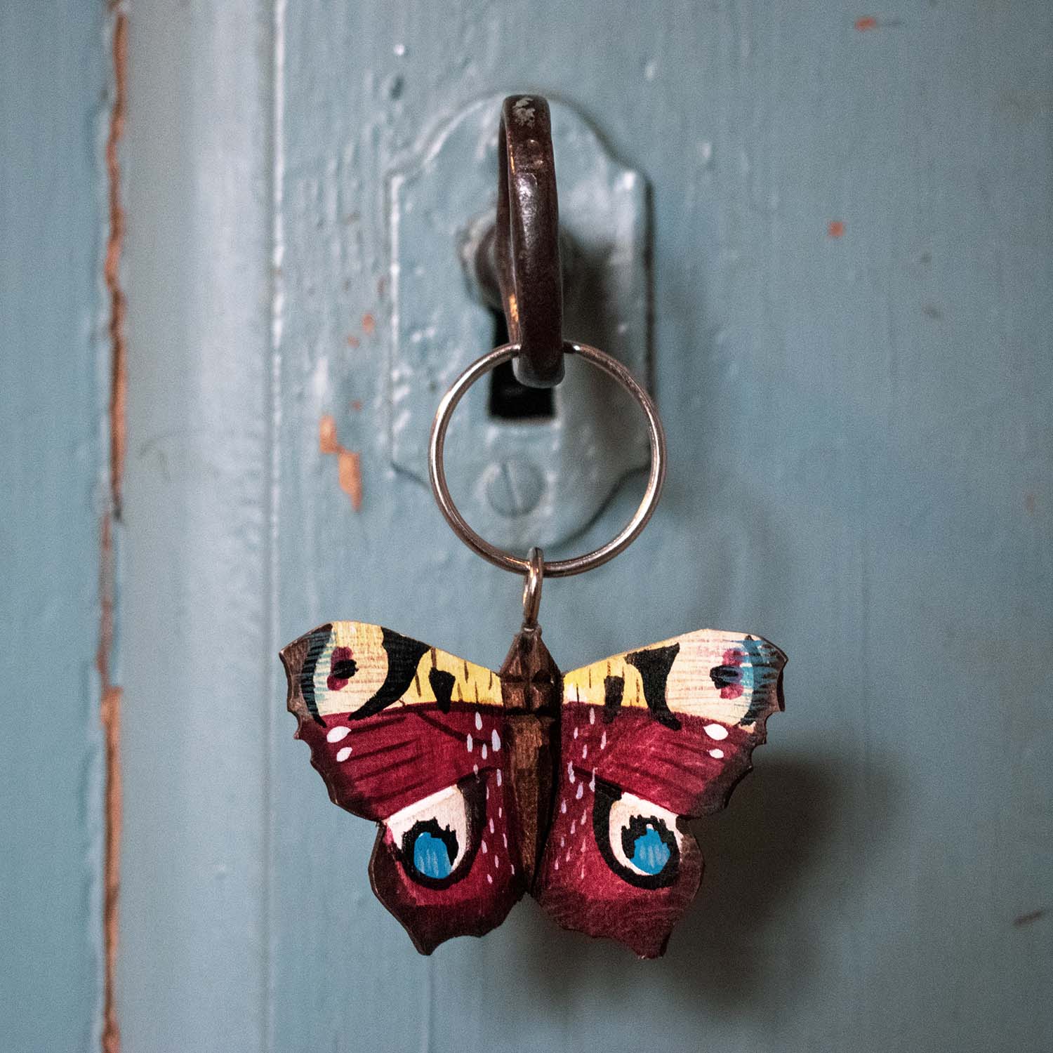 Schmetterling handgeschnitzter Schlüsselanhänger